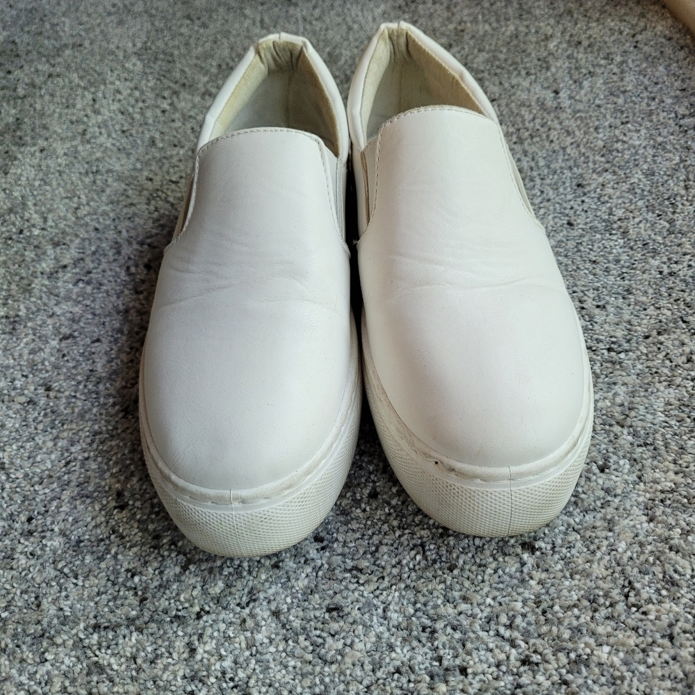 White slip-on platform sneakers
